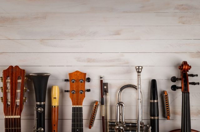 instruments-in-white-wooden-background-picture-id1219335974